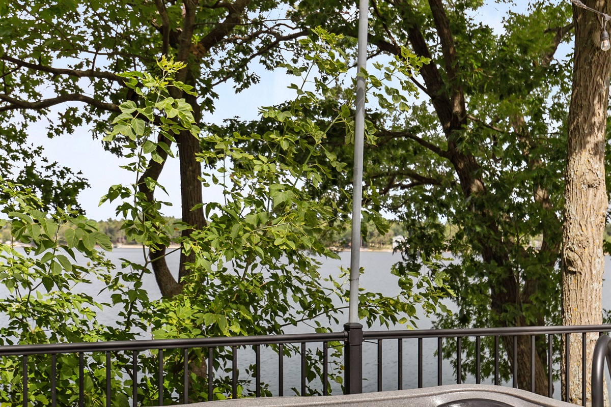 Beautiful trees surround the deck, giving you natural privacy and a peaceful retreat.