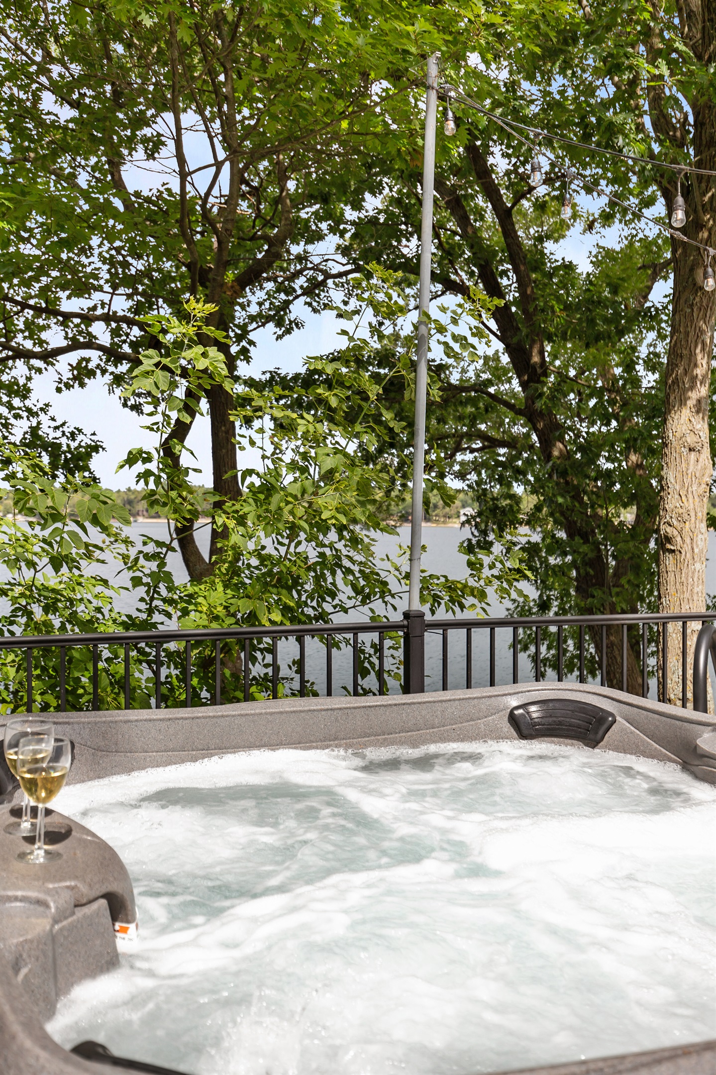 Beautiful trees surround the deck, giving you natural privacy and a peaceful retreat.