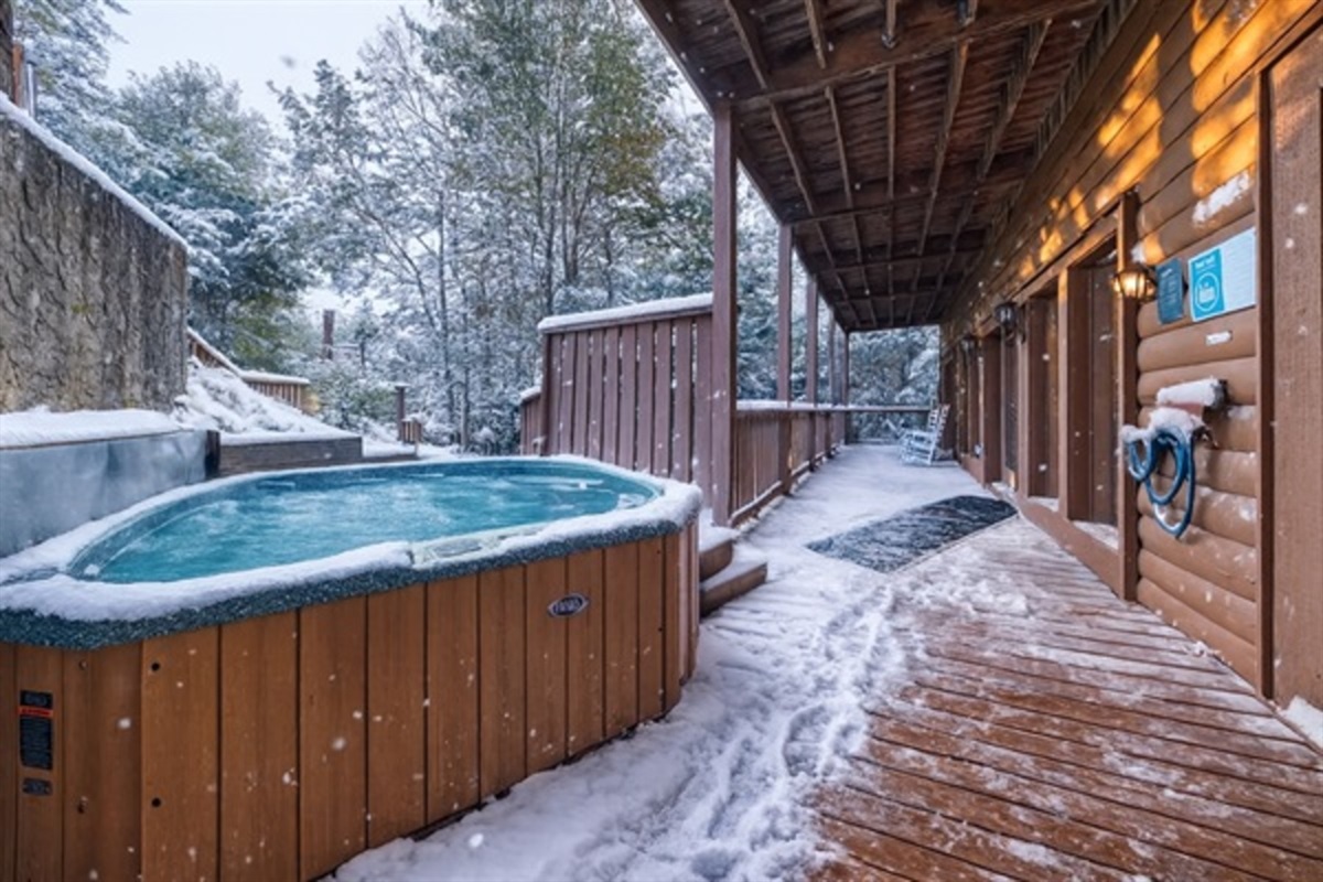 Soak under the stars in the private hot tub, the perfect way to unwind after full days spent together.