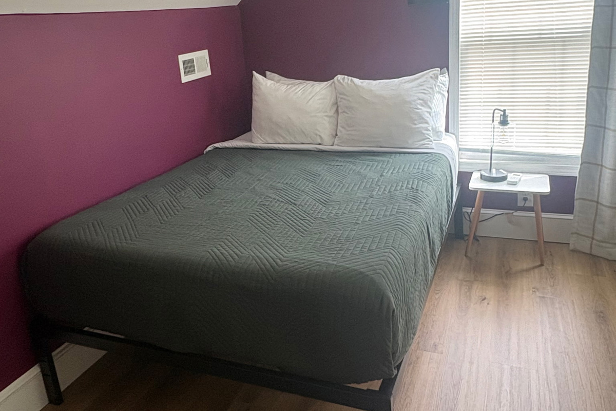 Main House Bedroom #2 with Queen and Full Beds, blackout curtains and sound machine.