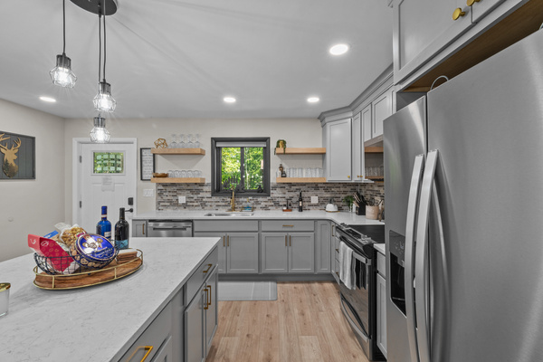 Light color scheme that bounces natural light and creates an open feel