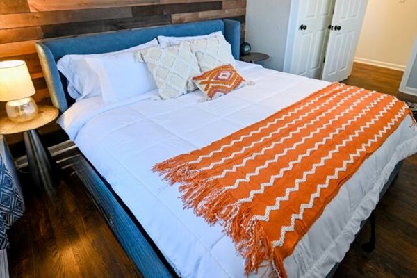 The king bedroom features an ultra-comfy, organic cotton king size mattress.