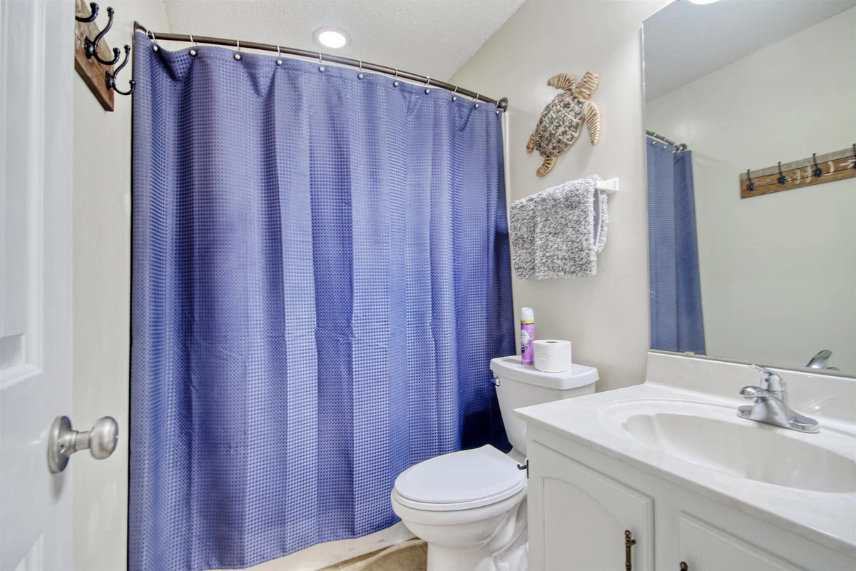 Primary bathroom with tub/shower combo