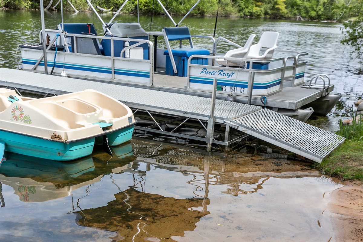 Stretch out, relax, and enjoy front-row views of the peaceful lake from the pier.