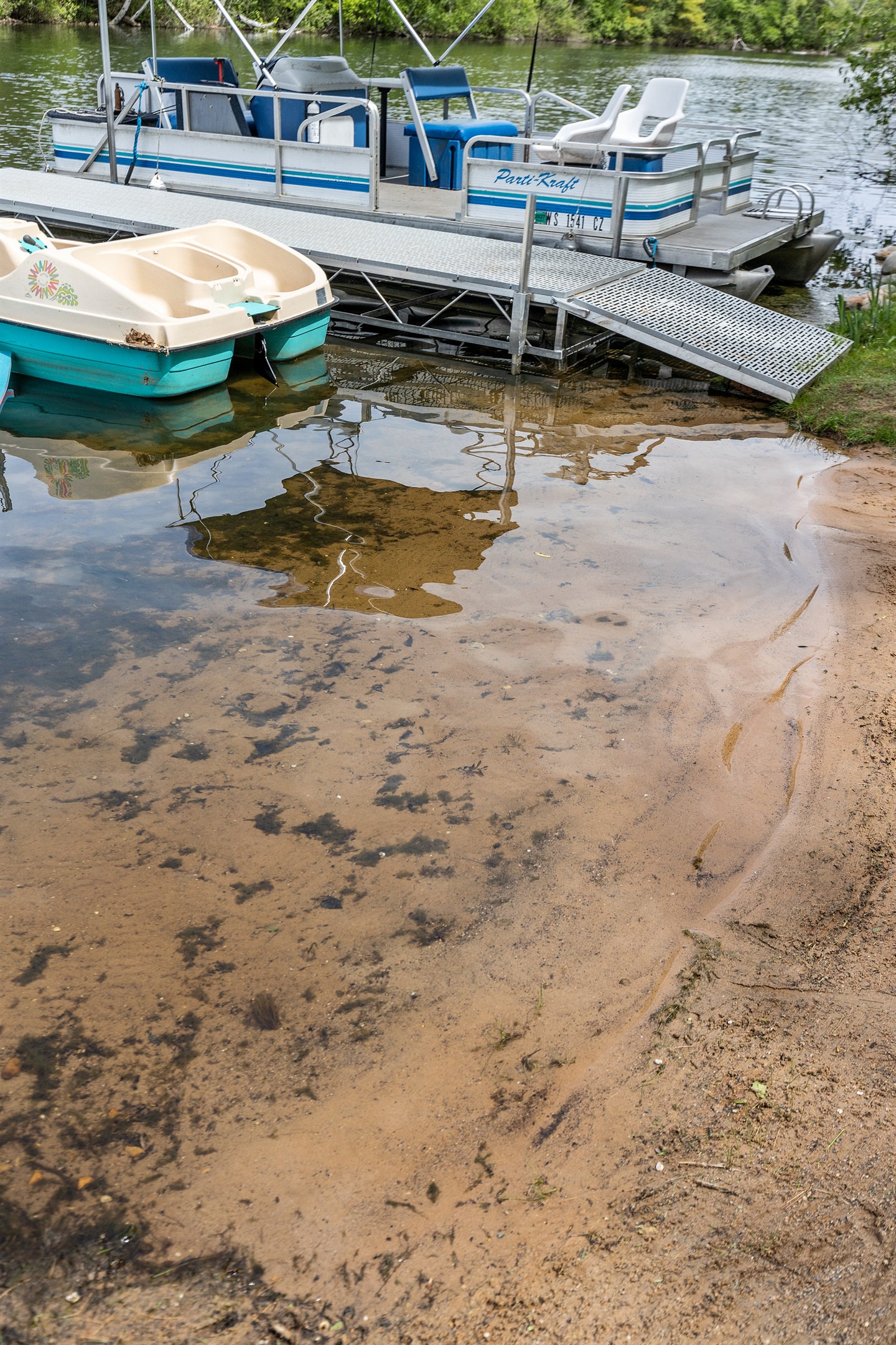 Stretch out, relax, and enjoy front-row views of the peaceful lake from the pier.