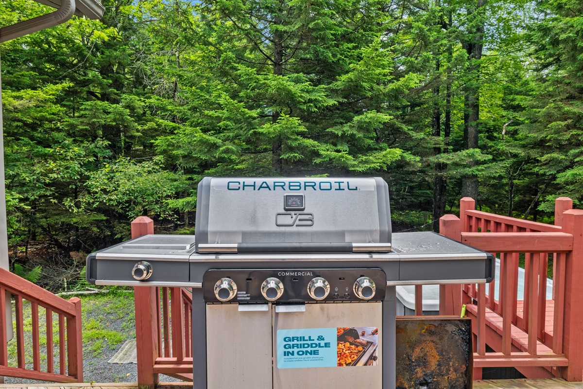 Spacious deck with grill and outdoor dining—perfect for cookouts and gatherings