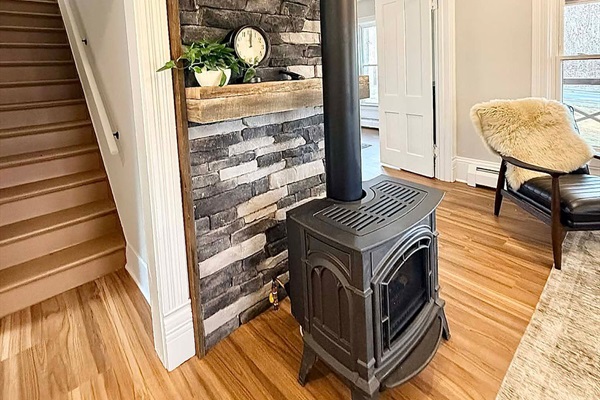 Cozy up to this wood burning fireplace 