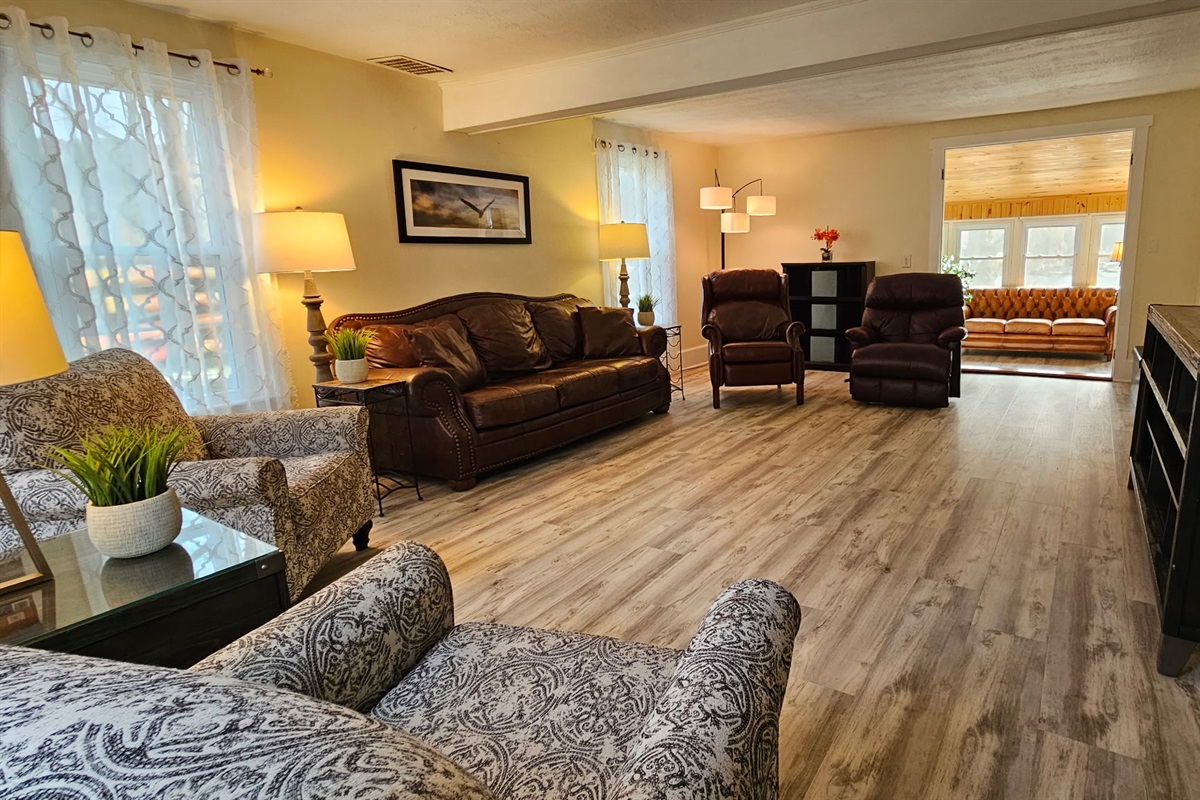 New floors throughout! Showcased here in the wonderfully large living room.
