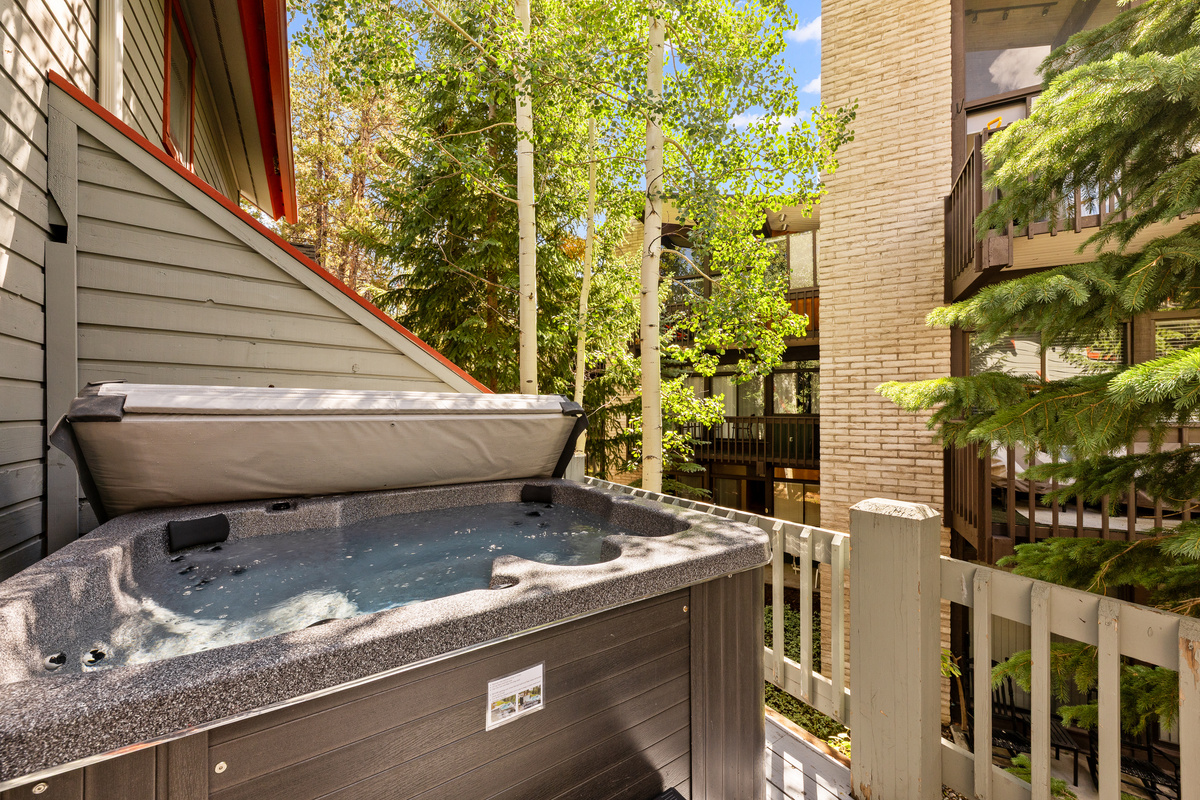 Private hot tub on rear balcony of home. 