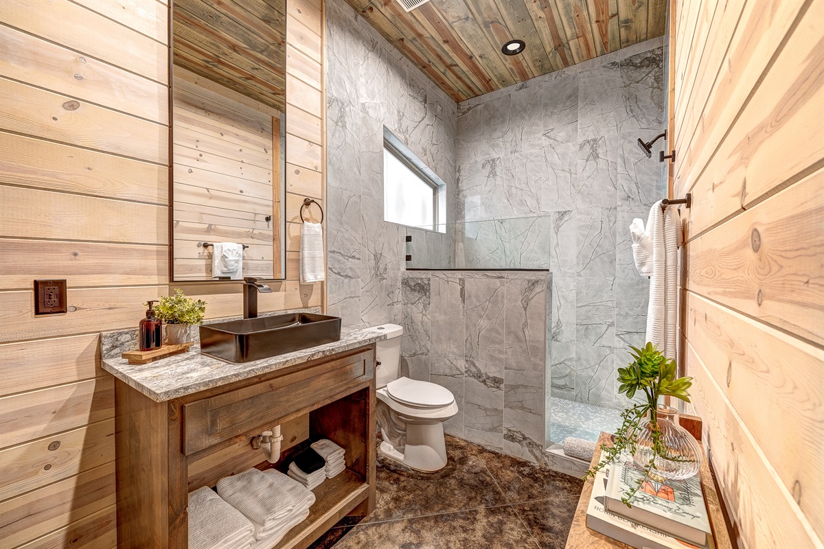 Jack and Jill bath between bedroom 2 and bunkroom.  Full walk-in shower and additional storage for your toiletries.