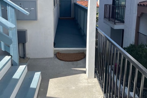 Private entry (with only one stair) with self check-in key pad.  The parking for this unit is down two flights of stairs but people could be dropped off in driveway above to have just one stair to enter this condo.