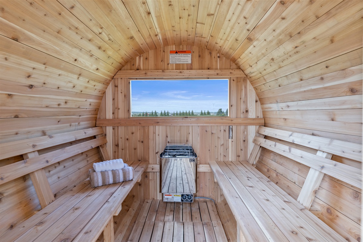 Step into a custom wood barrel sauna for the ultimate relaxation, blending rustic charm with modern comfort.
