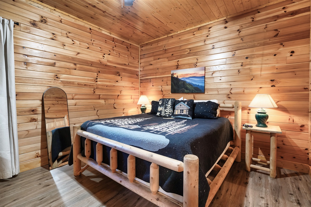 downstairs king bedroom with Roku tv