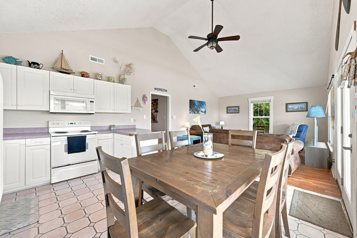 The open dining and kitchen layout keeps everyone connected whether you're cooking, dining, or spending quality time together