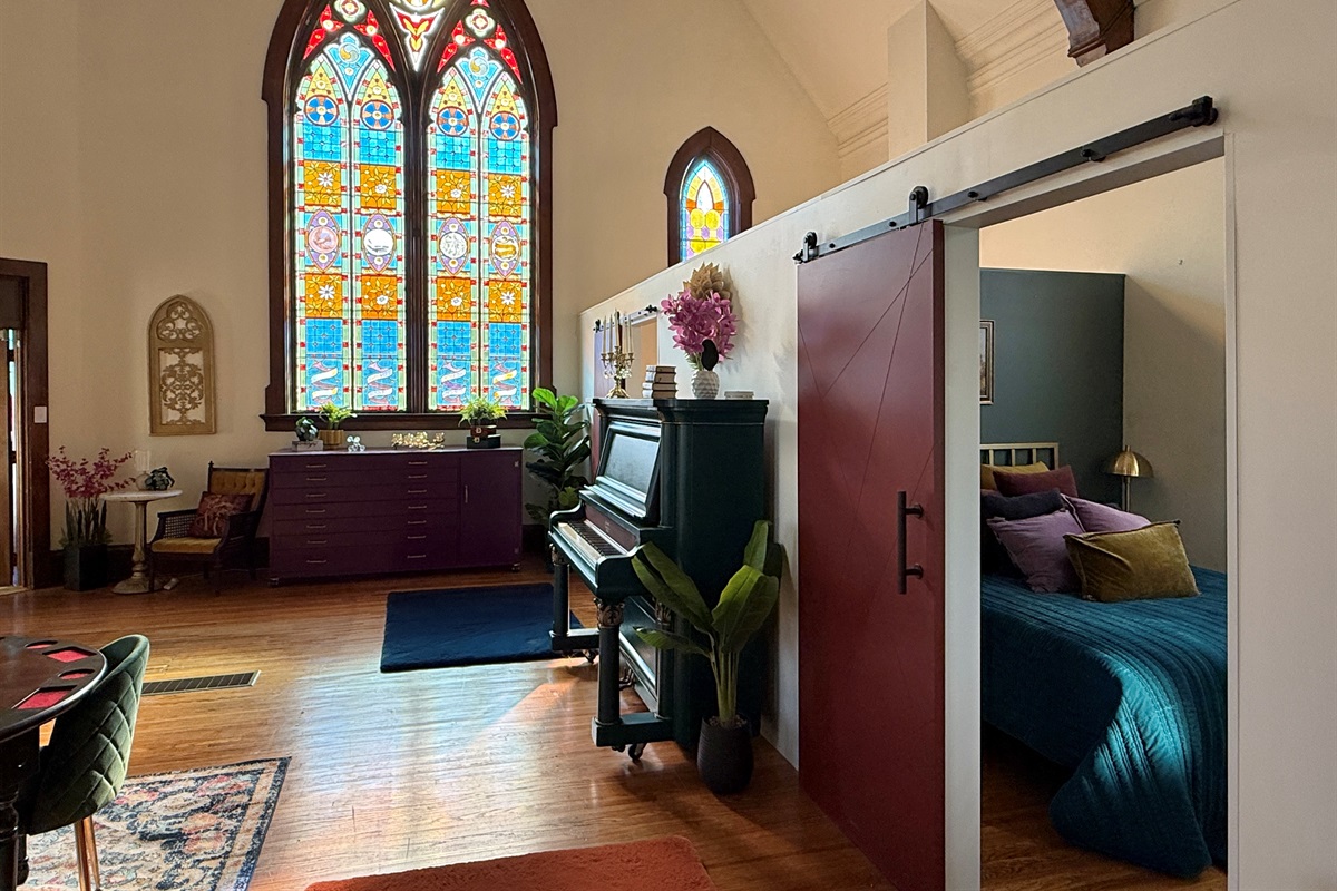 Loft space with gorgeous stained glass windows