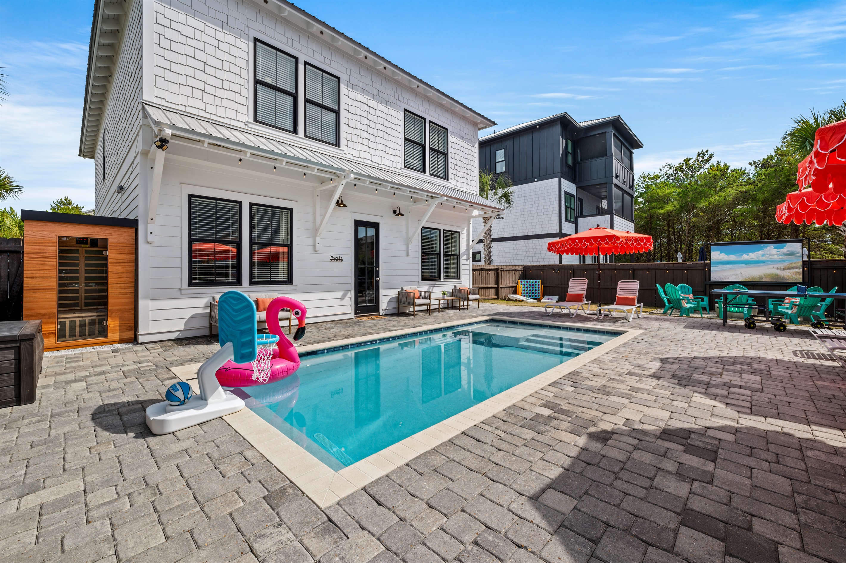 Your own backyard resort in Miramar Beach. Private pool, outdoor movie nights, ping pong, and plenty of room to relax after a day at the beach. Family vacation memories start here.