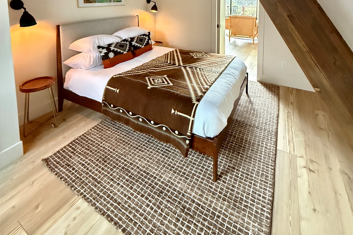 First floor bedroom with queen bed