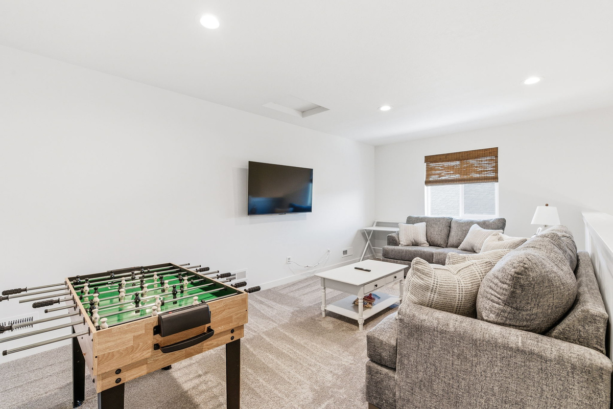 Game on! Whether it's a foosball showdown or a family movie marathon, this bonus room is made for laughter, friendly competition, and unforgettable nights together.