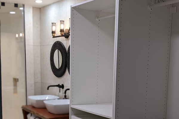 This is the primary Bathrooms View from the bedroom. We have Dual open closet systems with plenty of space for you to spread your 15 bathing suits you bring;) 
