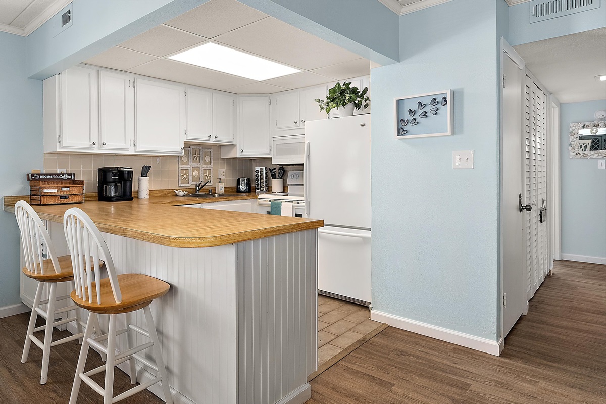The open kitchen provides a great space for cooking and socializing at the same time