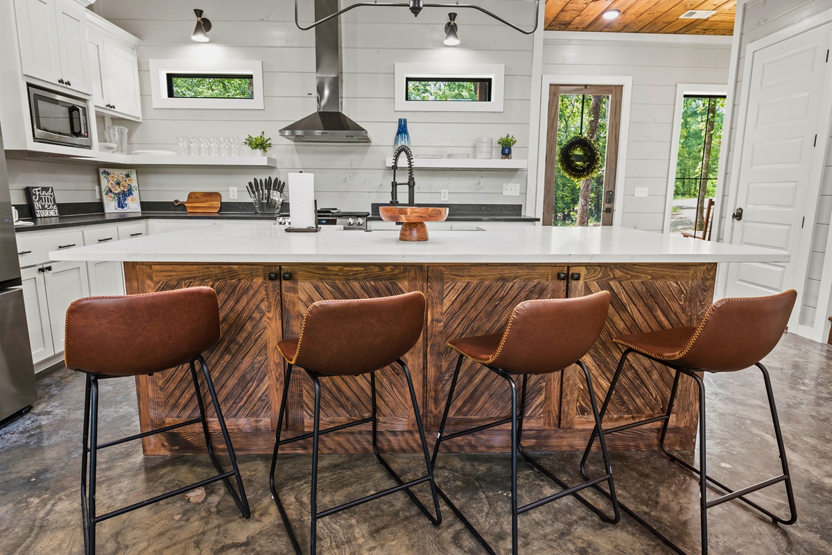 Pull up a stool and let's chat! This kitchen bar is just the spot for morning coffee or an evening glass of wine.