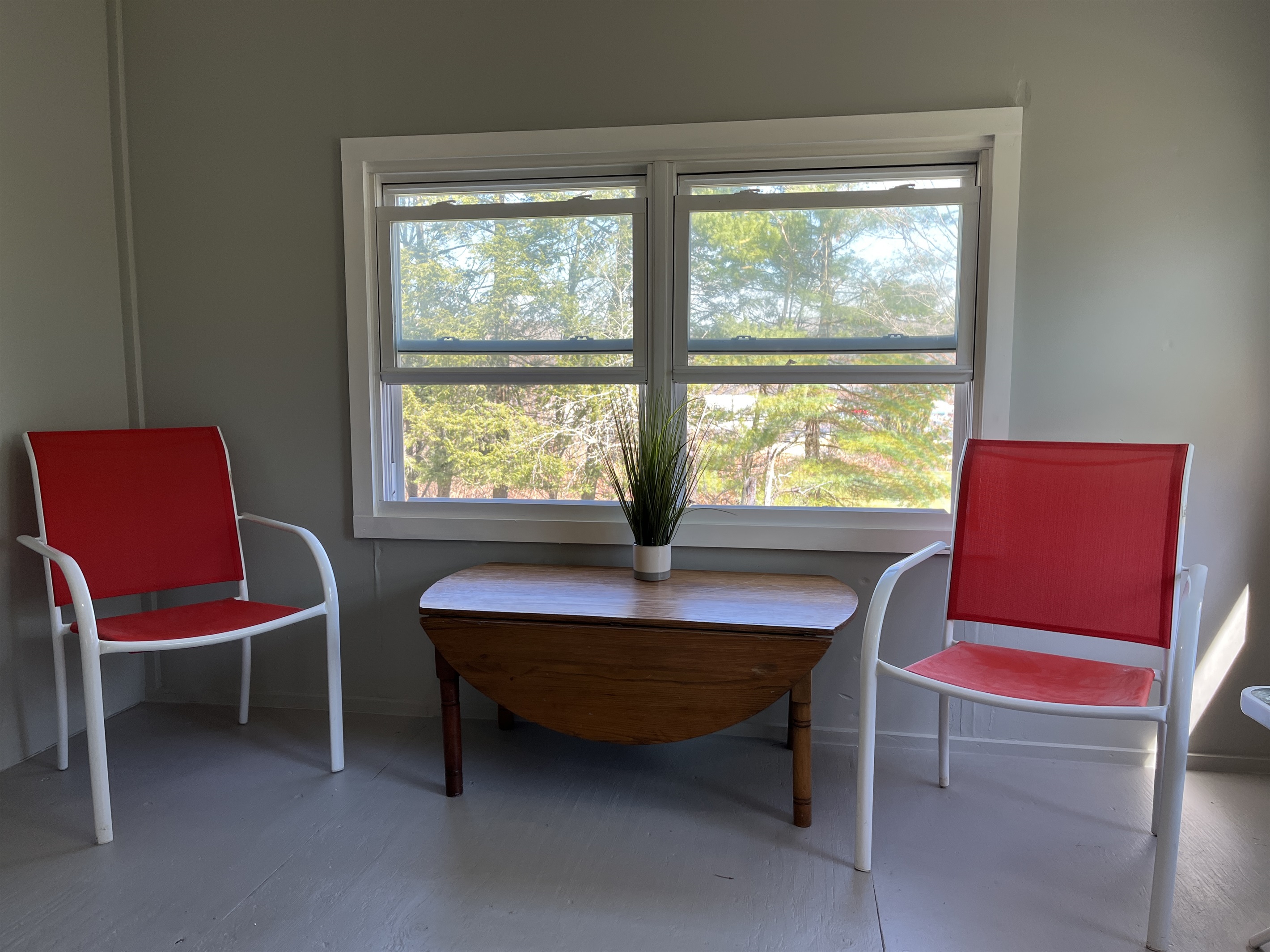 Sunroom overlooking backyard