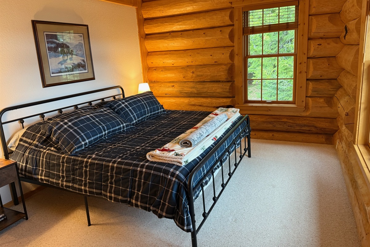 King sized bed in upstairs guest