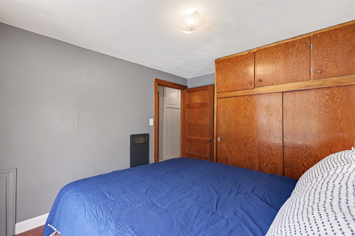 Bedroom #1 with slider to pool