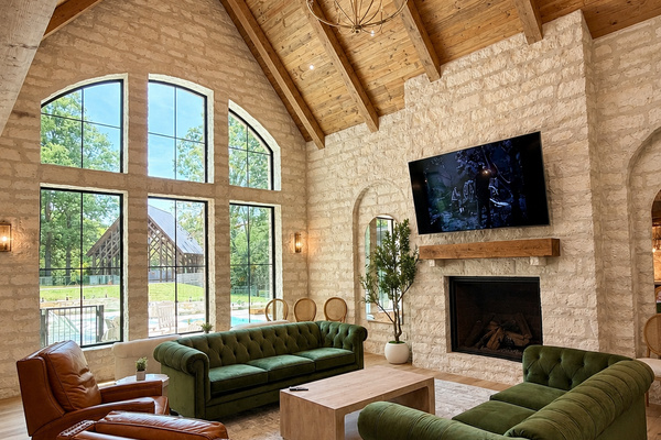 Lodge room with view of pool and outdoor pavilion