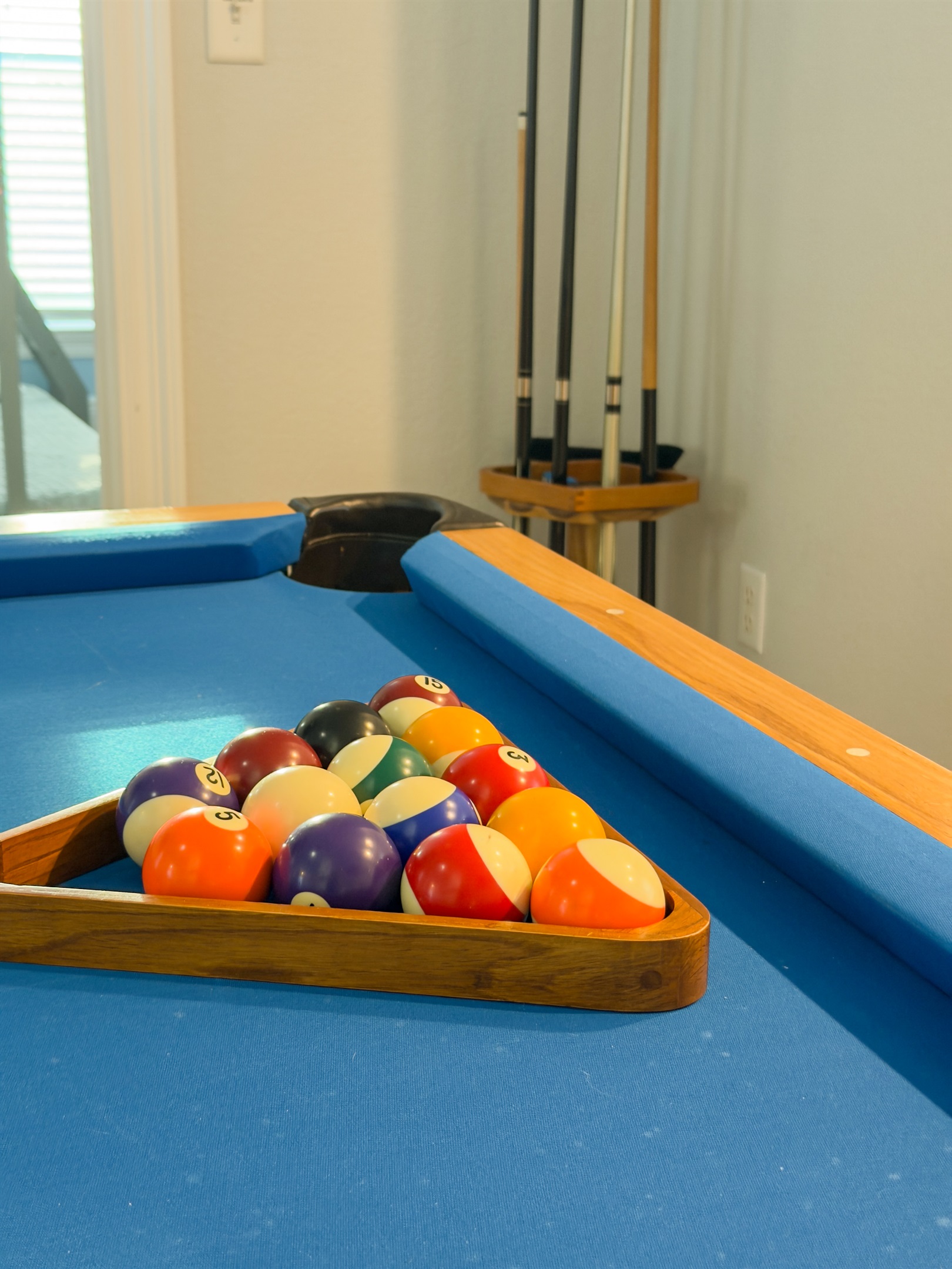 A full billiards setup creates the perfect spot to unwind, challenge friends, and keep the vacation fun going indoors.