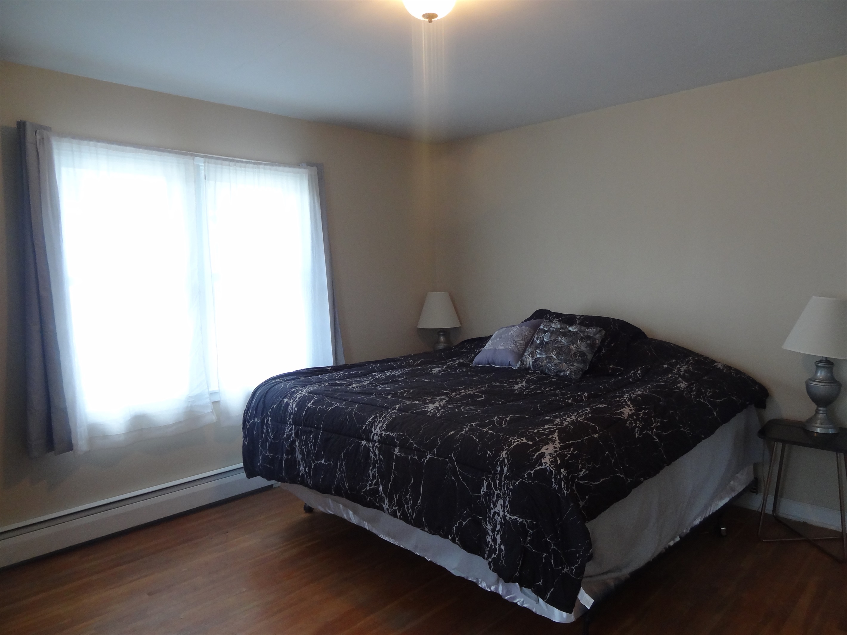 King bed with Roku smart TV