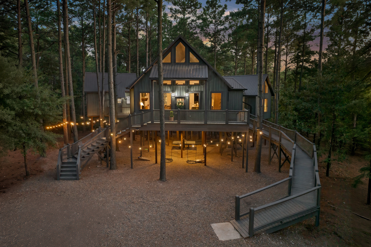High Life Treehouse — a one-of-a-kind luxury retreat tucked high among the towering pines of Hochatown.