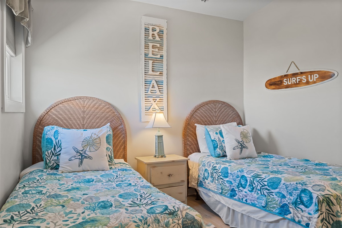 Kid's bedroom features a cozy setup