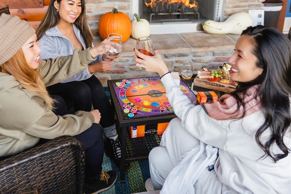 Main Level Covered Patio with Outdoor Fireplace — Perfect for Cozy Evenings and Gatherings.