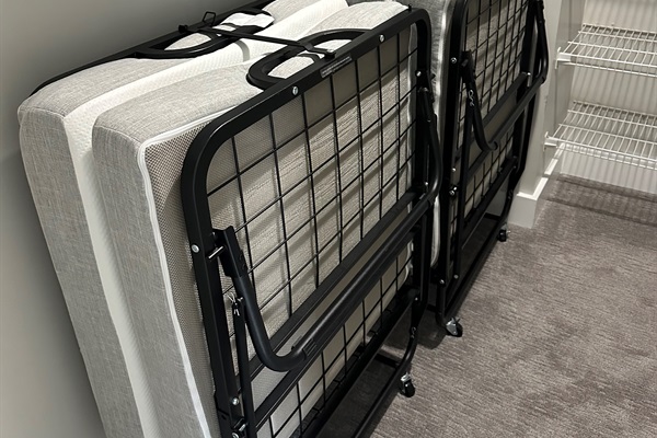 Twin beds stored in Master closet