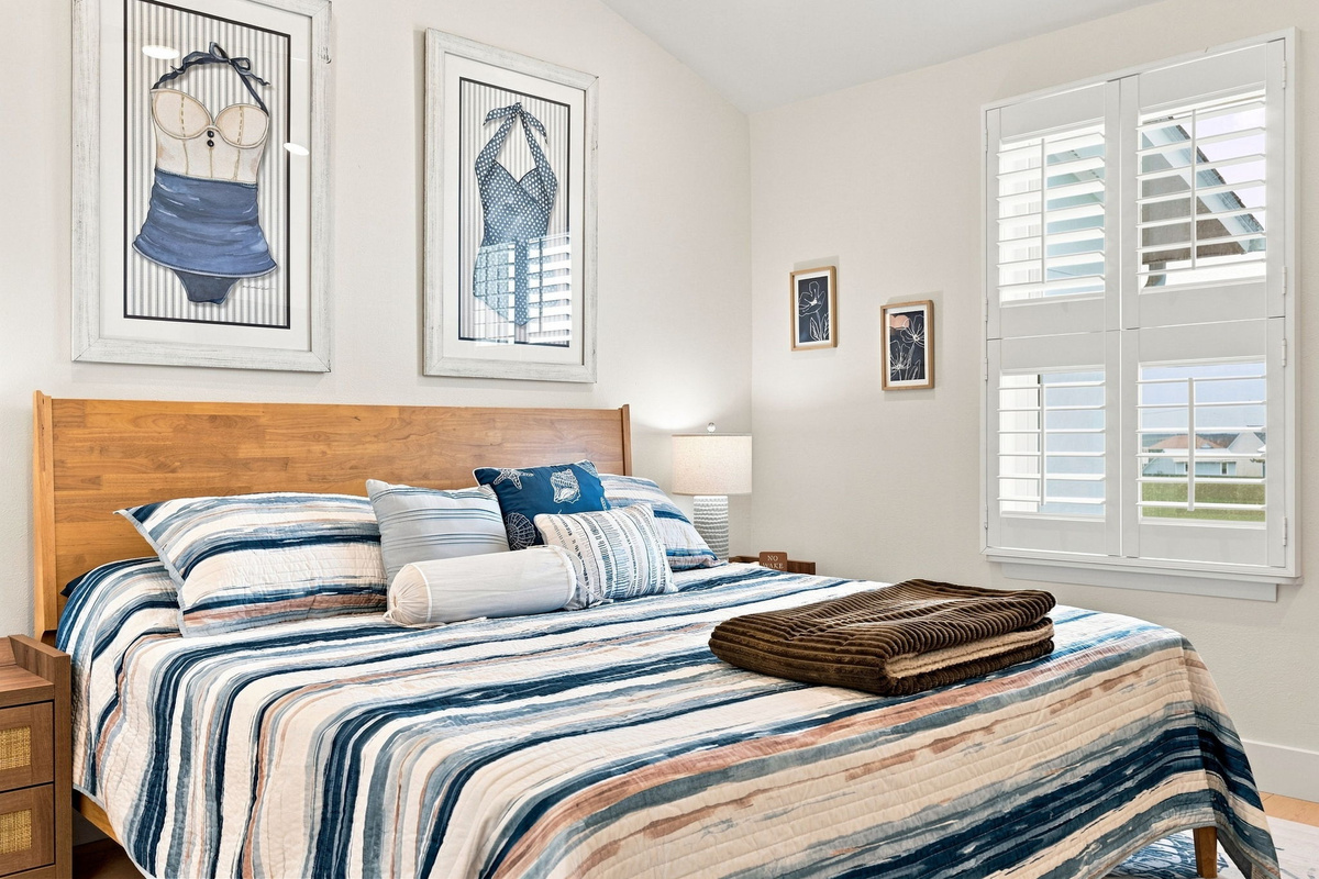 Modern furnishings meet breezy coastal accents for a look that feels both stylish and inviting.
