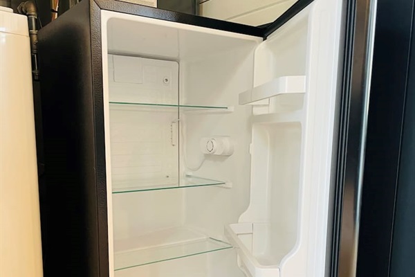 This treehouse offers a second mini fridge for your convenience