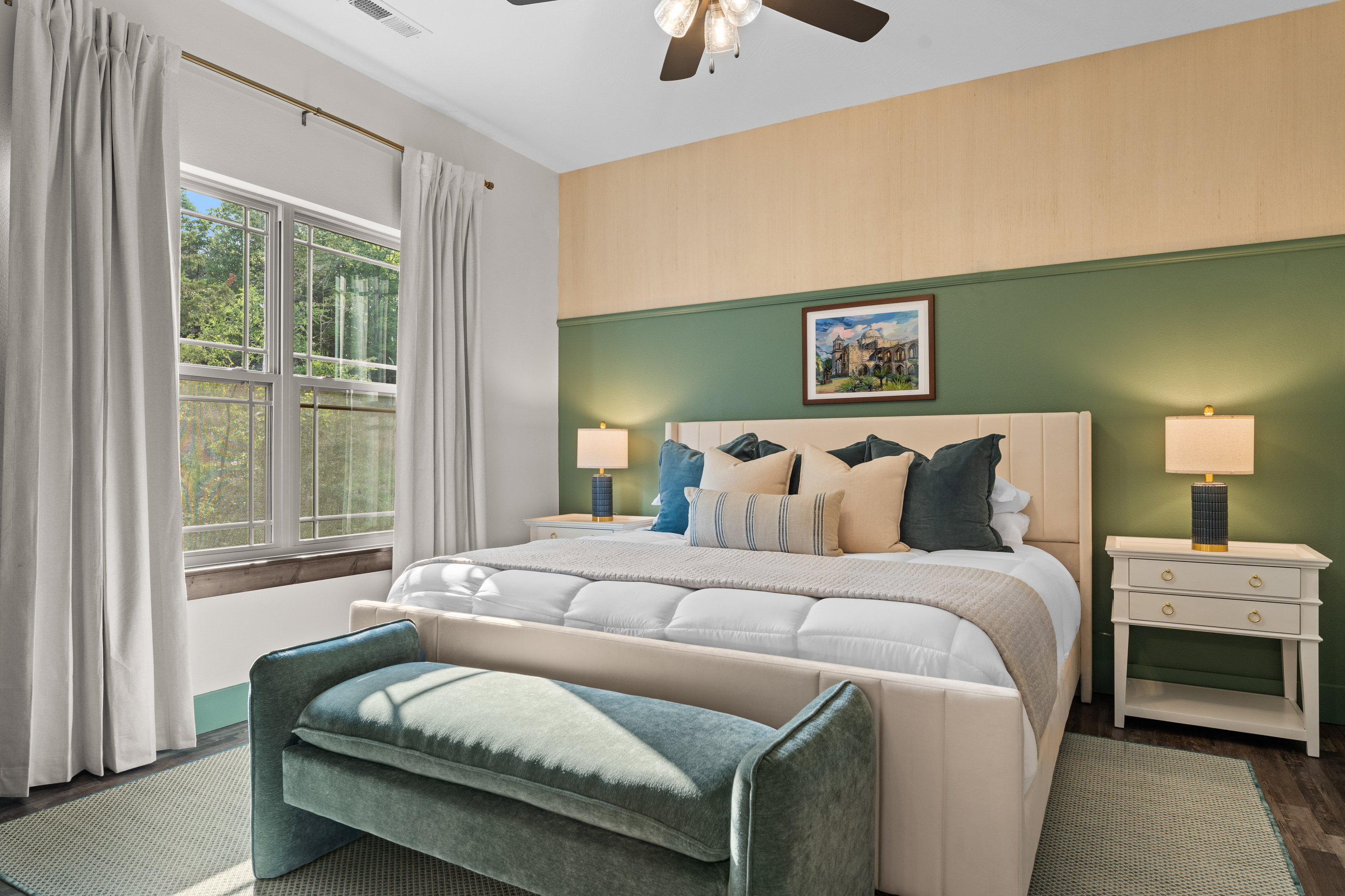 In the upstairs level, rest easy in the San Antonio Room, a king bedroom with a Spanish-mission painting and a channel-tufted headboard.