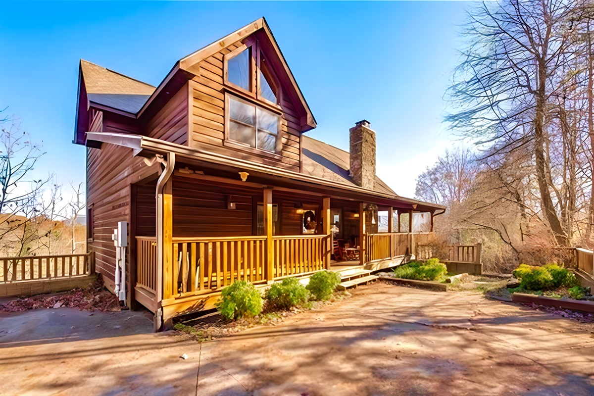 Step onto the porch of your mountain retreat, where the scent of cedar greets you and the morning sun dances across the cabin’s rustic charm.