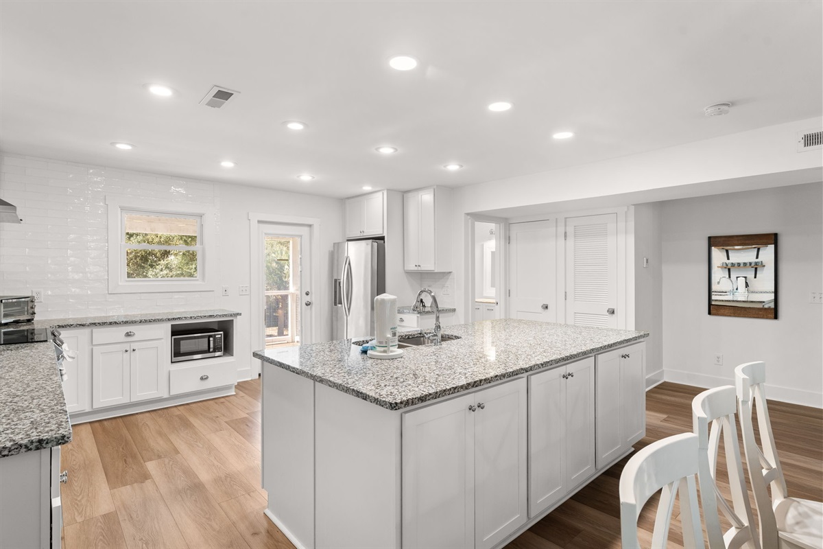 Side B: Open-concept 2nd-floor living area designed for group connection.