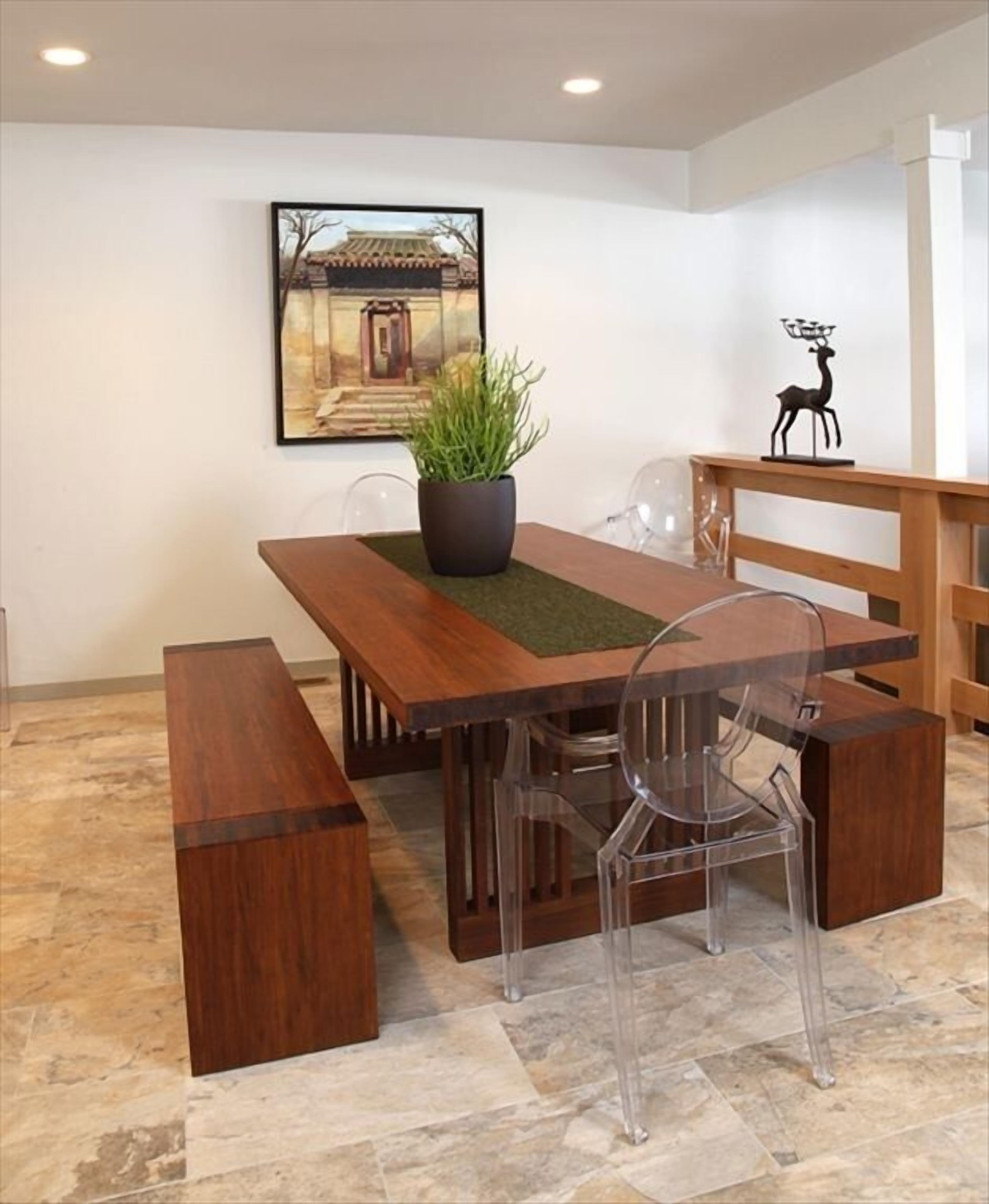 Dining room has view to the lake while the bamboo wood dining table seats 10