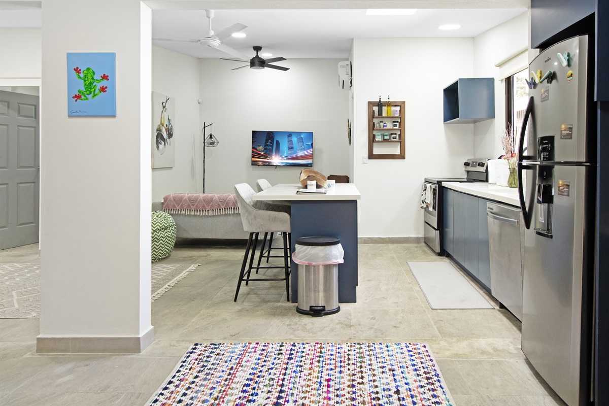 Casa Danta unit. Fully stocked kitchen with stove, dishwasher, microwave. Flatscreen TV in the lounge area