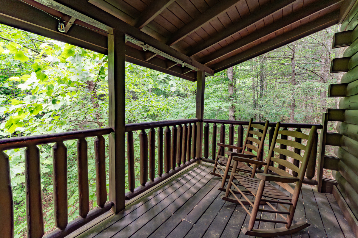 Enjoy the peaceful wooded views while you rock your worries away.