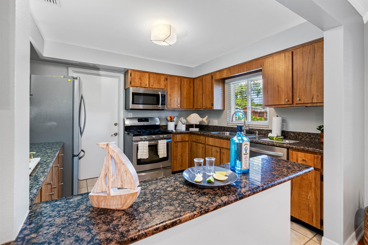 Cook like a local in this fully equipped kitchen with stainless steel appliances and plenty of prep space.
