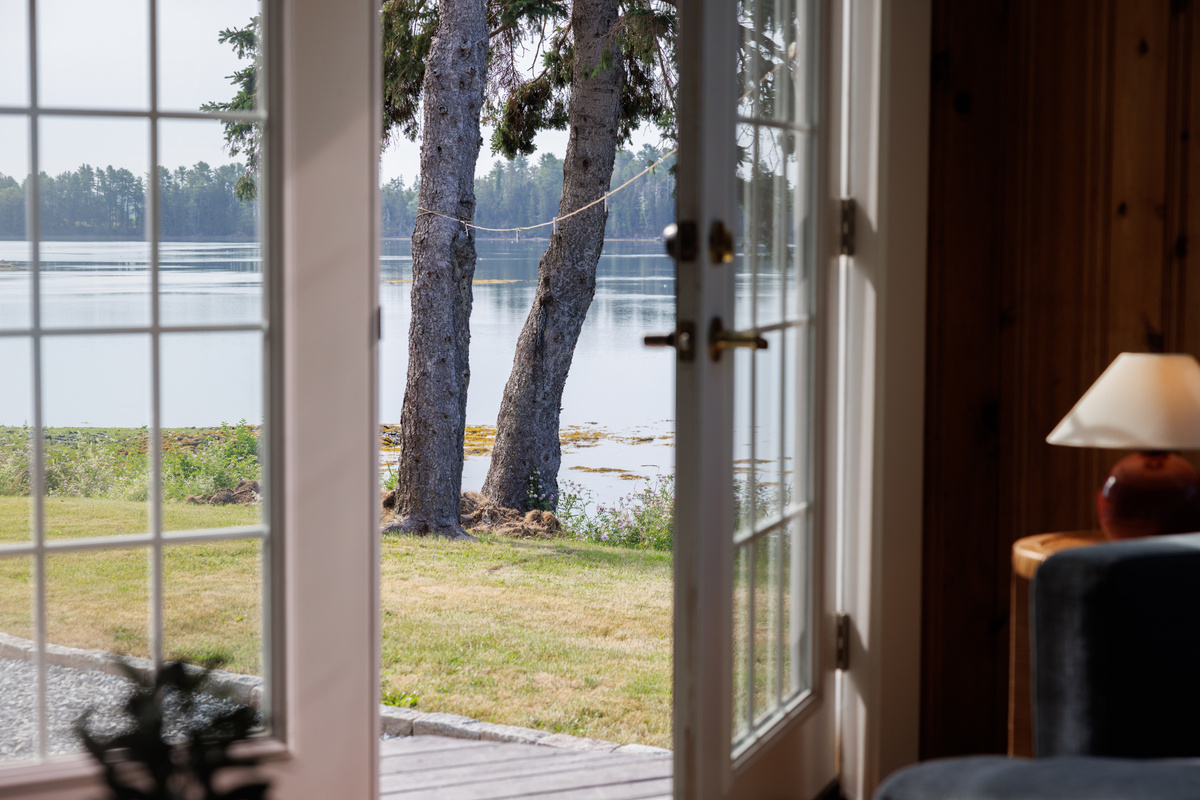 Pour something and find your spot when the light shifts late in the afternoon — lamps on, cove going dark outside, nobody with anywhere to be.