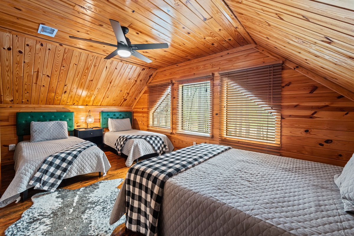 Cozy bedding and a welcoming layout make it a comfortable spot to wind down and get a good night’s rest.