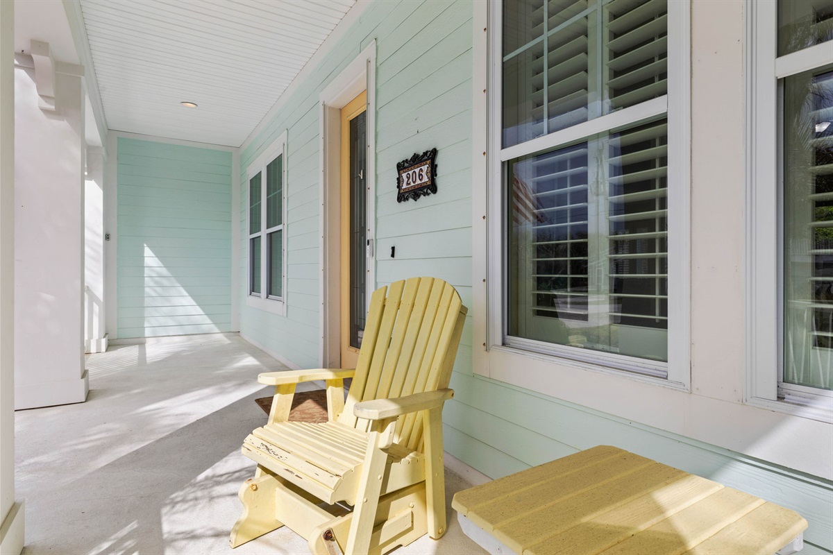 Arrive, drop your bags, and sink into the yellow rocker with that first deep breath of vacation—morning coffee on the porch, salty air in the breeze, and a front-door welcome that feels warm, easy, and instantly like home.