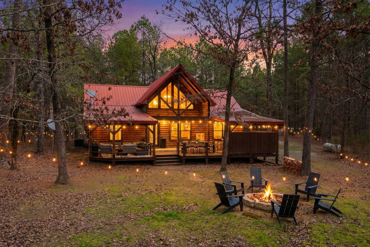 Nestled in the pines with space to breathe, this exterior offers privacy, convenience, and upscale rustic charm all in one inviting setting.