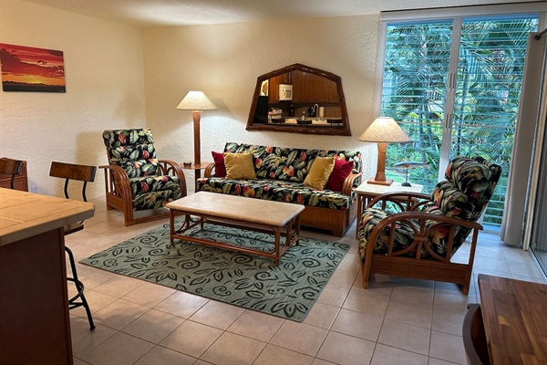 Comfortable island-style living room with tropical furnishings and plenty of space to unwind after a day of adventure.