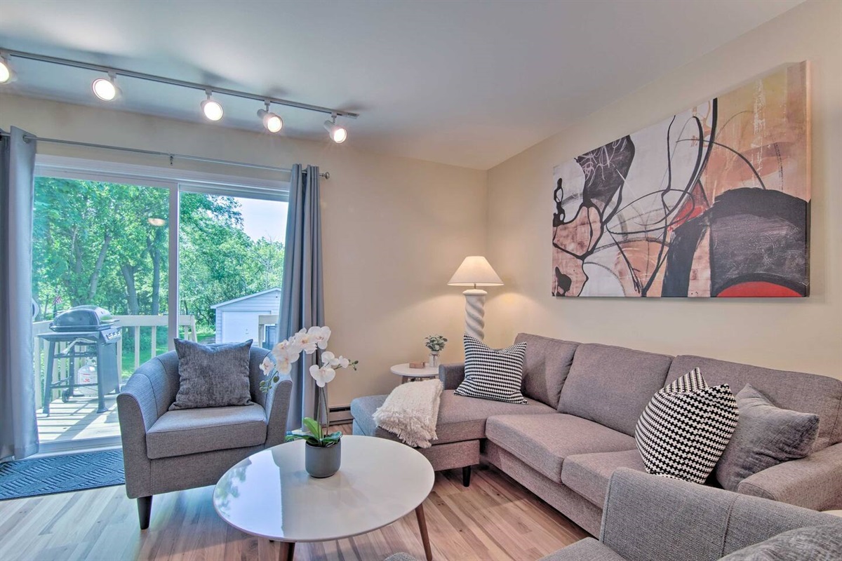 Relax and stream video with the high-speed internet in the comfortable living room which also leads to the private deck. 